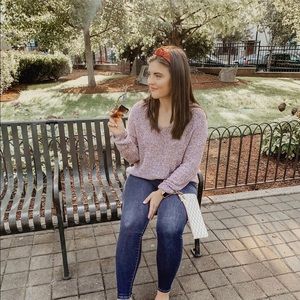 Multicolored sweater with lace up back